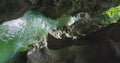 Hiking trail boardwalks along Lammer river in narrow rocky Dark Gorge in Austria. Vertical view.