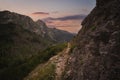 Hiking trail high in the Polish Tatra Mountains at sunset in summer Royalty Free Stock Photo