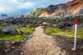 Hiking trail and a marker in beautiful colorful volcanic mountains Landmannalaugar in Iceland Royalty Free Stock Photo