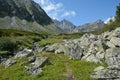 Hiking trail in a mountain valley Barguzinsky ridge at Lake Baikal. Royalty Free Stock Photo