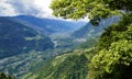 hiking trail over alpine valley of city Merano surrounded by Texel group mountains (Oetztaler Alps, South Tyrol, Italy)