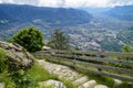 hiking trail over alpine valley of city Merano surrounded by Texel group mountains (Oetztaler Alps, South Tyrol, Italy)