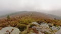 Hiking trail over foggy Ticknock mountains, Ireland