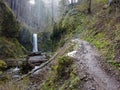 A Hiking Trail Passes a Scenic Waterfall in Oregon Royalty Free Stock Photo