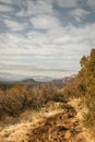 Hiking trail at the popular Airport Mesa loop hike in Sedona Arizona USA southwest during the day with beautiful clouds in the sky Royalty Free Stock Photo