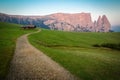 Hiking trail with Schlern mountain, Seiser Alm, South Tyrol, Italy Royalty Free Stock Photo