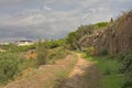 Hiking trail thorugh nature on Montjuic hill with olympic stadium of Barcelona in the background Royalty Free Stock Photo