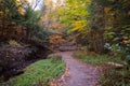 Hiking trail to Munising Falls waterfall in Pictured Rocks National Lakeshore during fall season Royalty Free Stock Photo