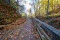 Hiking trail to Munising Falls waterfall in Pictured Rocks National Lakeshore during fall season Royalty Free Stock Photo