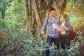 Love couple Hiking trail and trekking in the forest with friends. Royalty Free Stock Photo