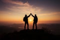 Hiking triumph, Silhouetted hands raised in teamworks victorious celebration on mountain