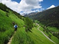 Hiking walking backpacking trekking Alps South Tyrol Italy Royalty Free Stock Photo