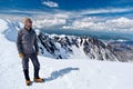 Hiking in Washington. Man climber on mountain top. Happy person on summit of Mount St Helens. Royalty Free Stock Photo