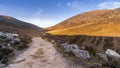 Winding trail in the valley between Slieve Donard and Rocky Mountain in Mourne Mountains