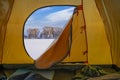 Hiking winter travel concept. View from tent - beautiful landscape of snow nature Royalty Free Stock Photo