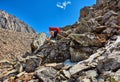 Hiking. Woman with a backpack gently descends