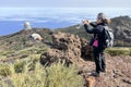 Hiking woman enjoying view in Roque de los Muchachos, Canary Islands, Spain