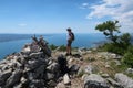 Hiking woman overlooking Adriatic see