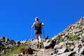 Hiking woman reaching goal on a trail near Chamonix