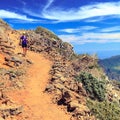 Hiking woman, runner hiker in summer mountains Royalty Free Stock Photo