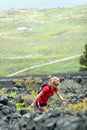 Hiking woman, runner in summer mountains Royalty Free Stock Photo