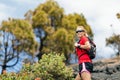 Hiking woman, runner in summer mountains Royalty Free Stock Photo