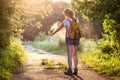 Hiking woman spraying insect repellent Royalty Free Stock Photo