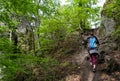 Hiking woman and Sulov castle, Slovakia