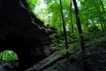 Hiking a wooded trail in Kentucky leading to a cave. Royalty Free Stock Photo