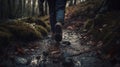 Hiking in the woods. A man walks along a mountain stream