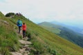 Hikkers on mountain path in Bieszczady Mountains, Poland