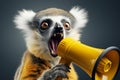 Hilarious lemur with a yellow loudspeaker, a creative and attention grabbing concept