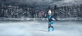 Hild  figure skater on winter lake  background Royalty Free Stock Photo