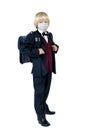 Hild schoolboy stand in school uniform and medical mask