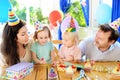 ?hildren and their parents having fun and celebrate birthday party Royalty Free Stock Photo