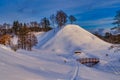 Hill Covered with Snow with Wooden Stairs Royalty Free Stock Photo