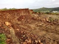 Hill cutting Environmental consequences of hill cutting are land slide, soil erosion, Flush Flooding and water logging during Royalty Free Stock Photo