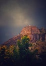 A hill with dark sky background