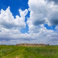 hill among green grass prairie Royalty Free Stock Photo