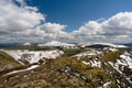 Hill of the Long Mynd, view on the Carding Mill Valley and Caer Caradoc, rocks in foreground, Shropshire Hills UK