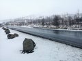 Hill road landscape in winter at Iceland. Asphalt road with sideways full of snow. Royalty Free Stock Photo