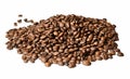 A hill of roasted coffee beans on a white isolated background. Close distance. Royalty Free Stock Photo