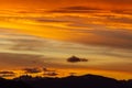Hill silhouettes under a cloudy sky during a breathtaking sunset in Patagonia, Argentina Royalty Free Stock Photo