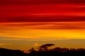 Hill silhouettes under a cloudy sky during a breathtaking sunset in Patagonia, Argentina Royalty Free Stock Photo