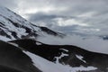 Hill with snow and fog