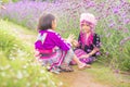 Hill tribe children playing with friend with traditional clothes Royalty Free Stock Photo