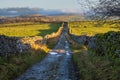 Hill walking the Norber Eratics around Austwick in Craven in  the Yorkshire Dales Royalty Free Stock Photo