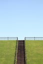 Hill with wooden stairs Royalty Free Stock Photo