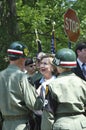Hillary Clinton speaks with members of military