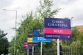 HILLINGDON, LONDON, ENGLAND - 14 August 2021: Sold signs outside a property